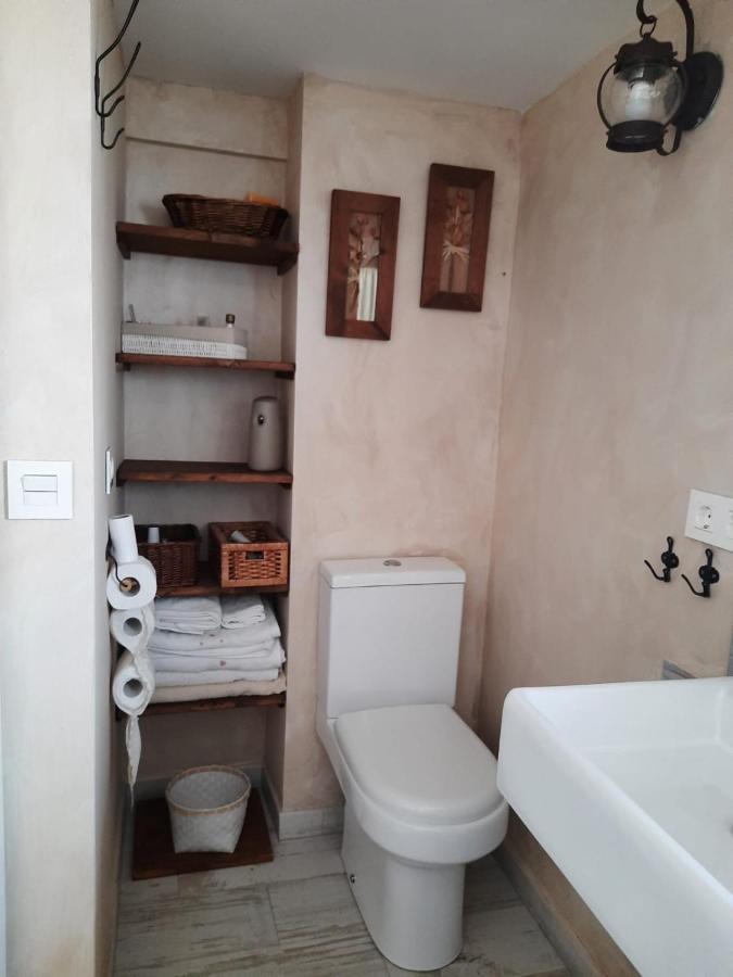 Un Apartamento Vacacional Con Detalles De Un Hogar Майрена-дель-Альхарафе Экстерьер фото